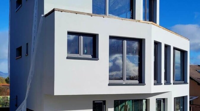 Explore a modern prefab home designed for efficiency, affordability, and modern living.